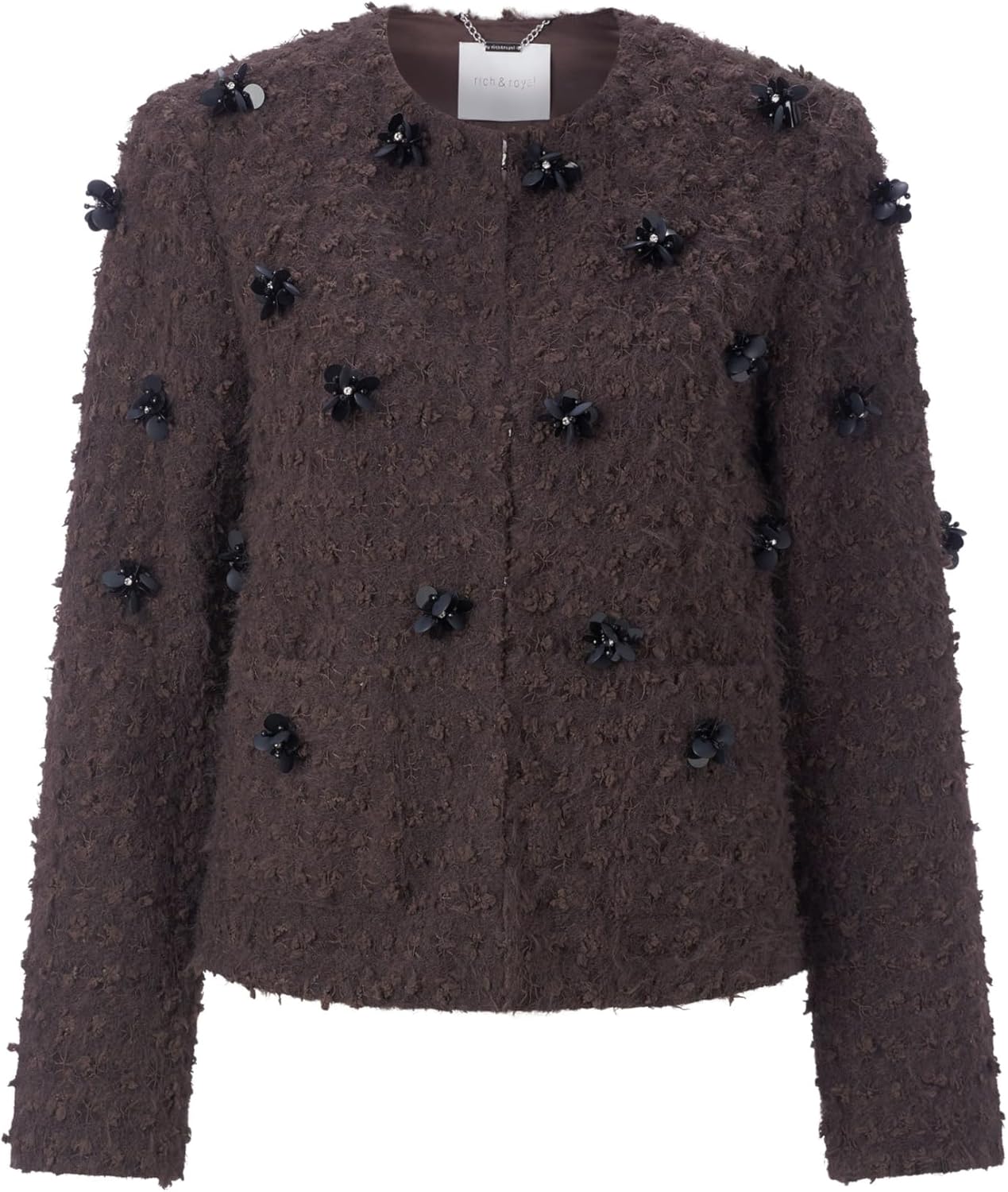 Rich Royal Bluse in Dark Chocolate auf einem Bürostuhl